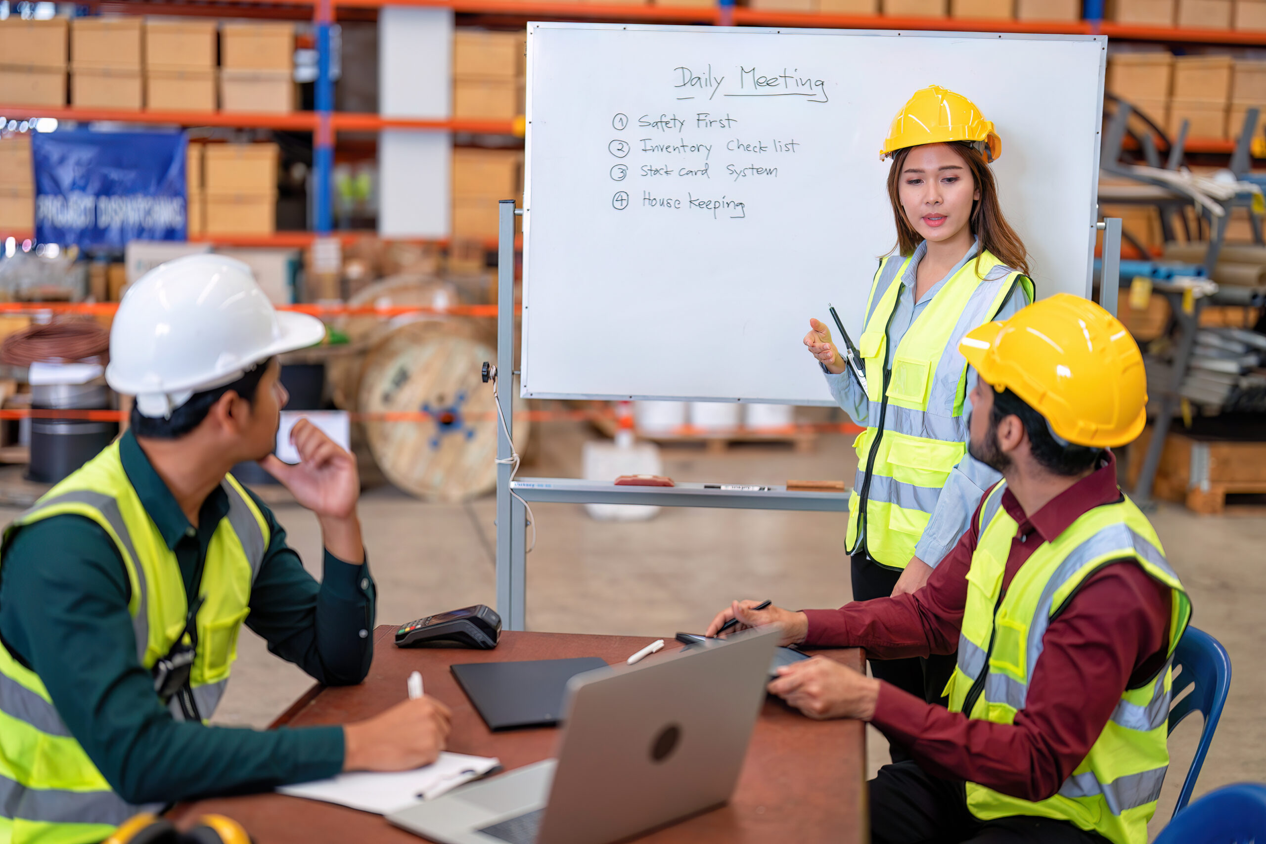 Group of worker in the warehouse factory conduct toolbox talk daily meeting focus on safety priority and house keeping in the morning before start working